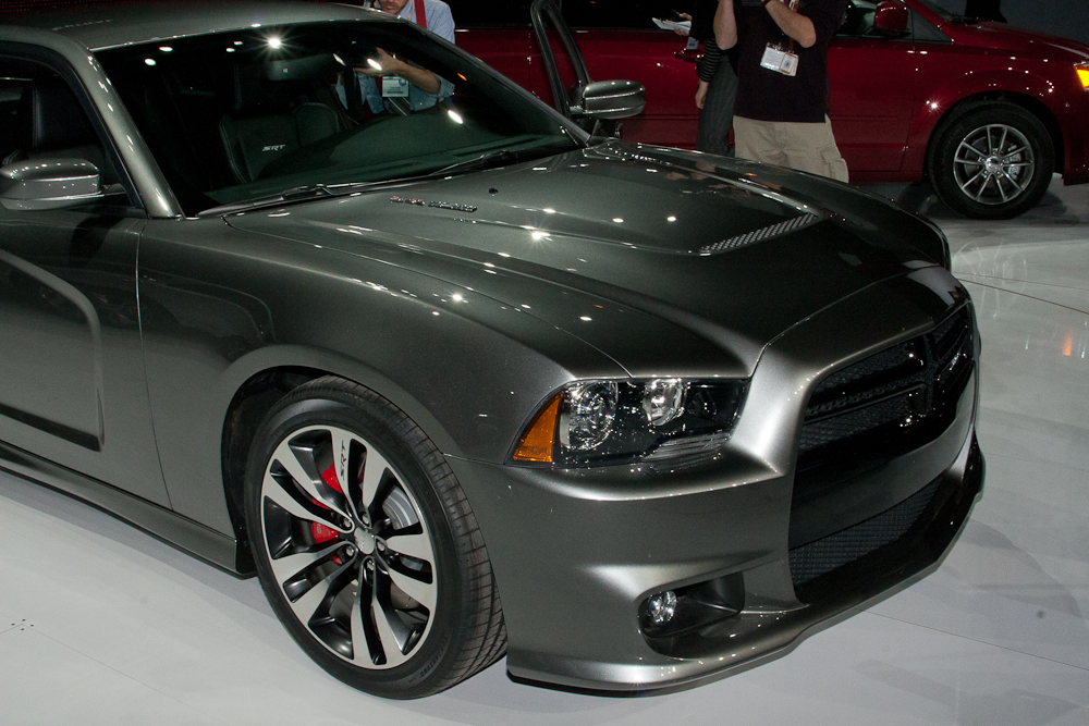 Dodge President CEO Ralph Gilles with the 2011 Charger R T