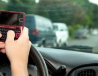 Watching Distracted Driving from the Back of a Taxi